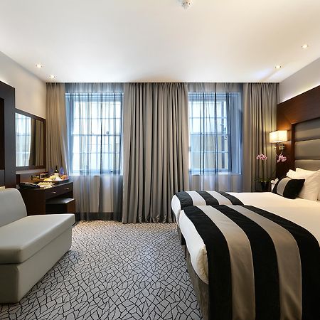 Park Grand London Lancaster Gate Hotel Quarto foto A room at the hotel